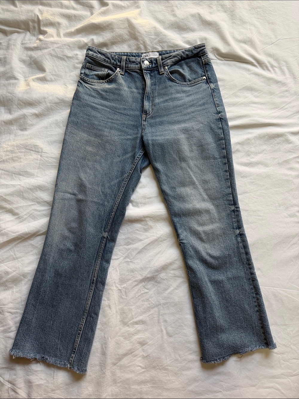 Zara Women's Light Blue Flared Raw-Hem Jeans